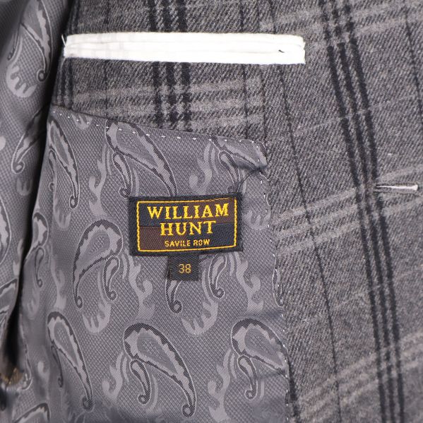 Detalj av innerficka med William Hunt-märke och paisleyfoder