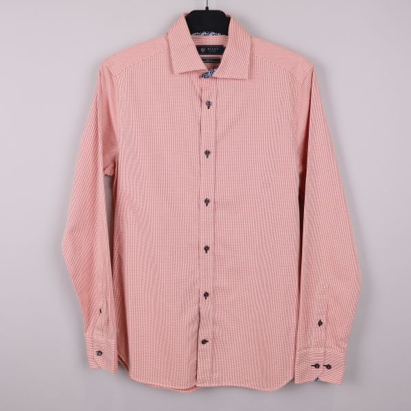 Rutig långärmad skjorta i orange och vitt framifrån