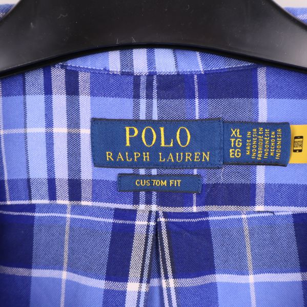 Polo Ralph Lauren etikett med storlek XL i kragen