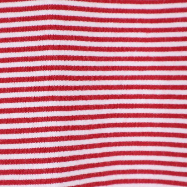 Närbild på det röda och vita randiga tyget