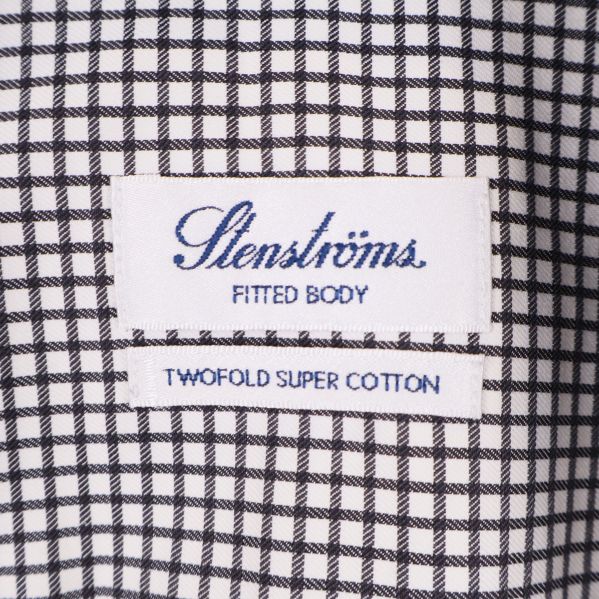 Närbild på etikett med Stenströms och tvåfalld bomull