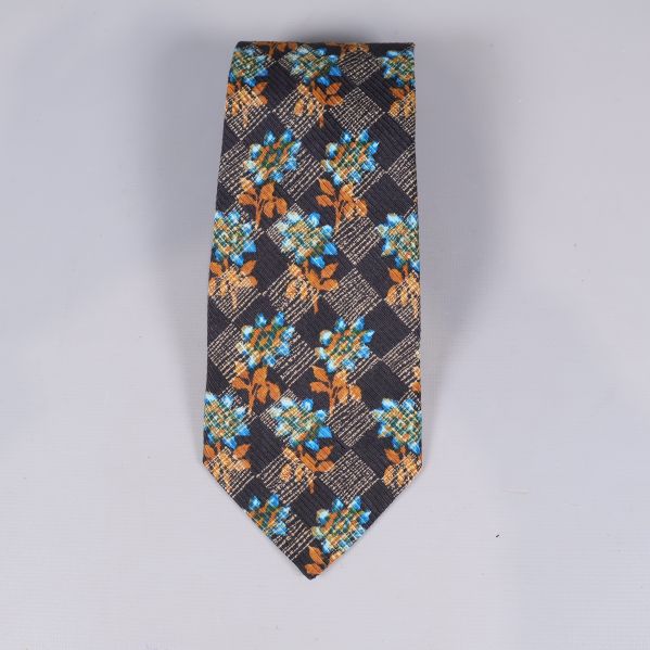 Slips med blått och orange blommönster framifrån