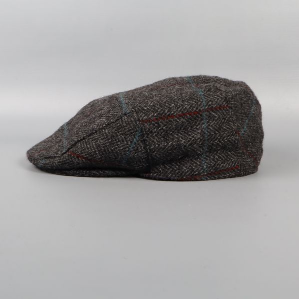 Flat cap sedd från sidan i profil