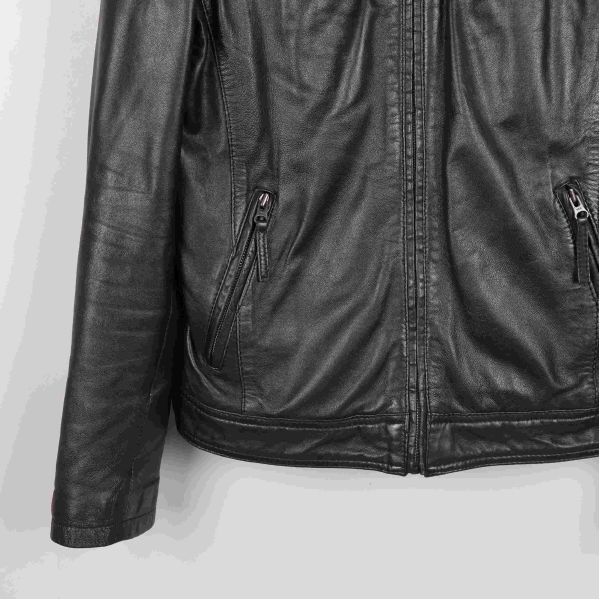 Detalj av dragkedjor och fickor