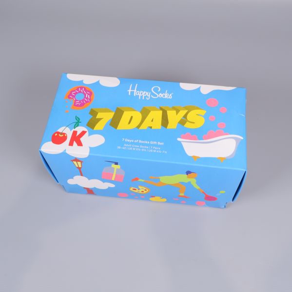 Framsidan av Happy Socks ask med texten 7 DAYS