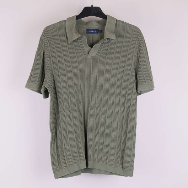 Grön stickad polotröja framifrån 