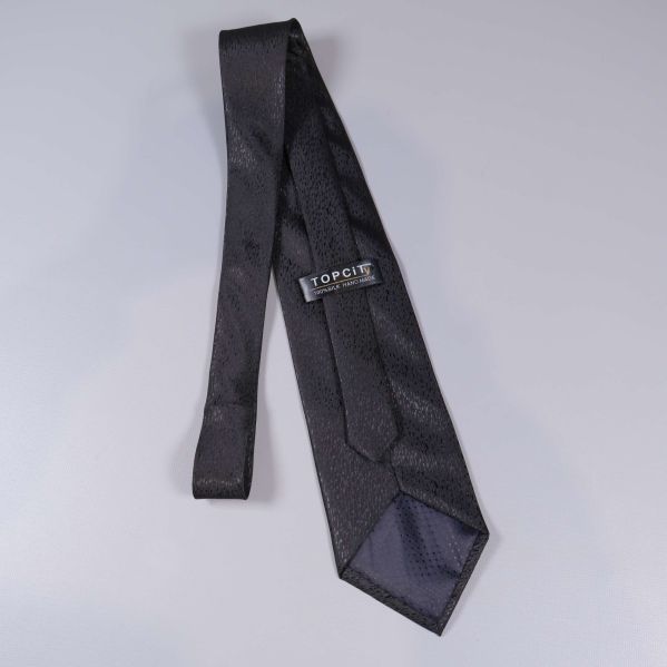 Baksida slips med Topcity-märke synligt