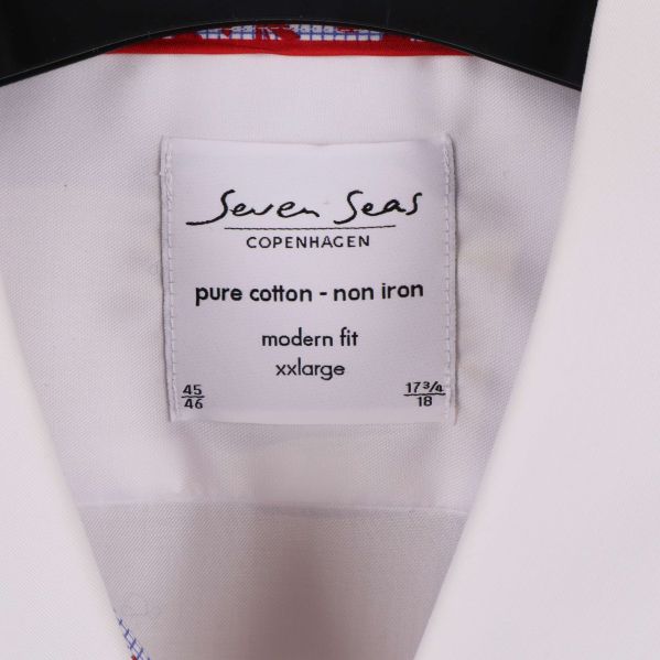 Närbild på varumärkesetikett Seven Seas Copenhagen