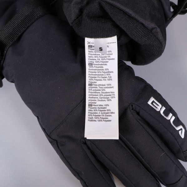 Material- och storleksetikett på insidan av handskarna