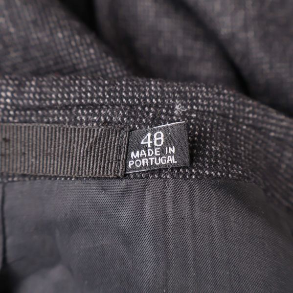 Storlekslapp med storlek 48 och Made in Portugal