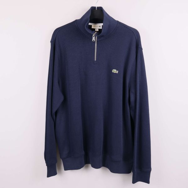 Blå Lacoste-tröja med halv dragkedja och krokodillogo