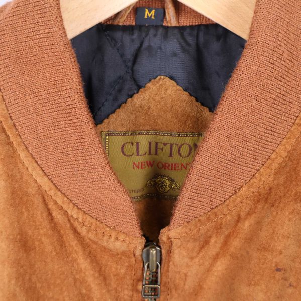 Jackans varumärkesetikett och innerfoder