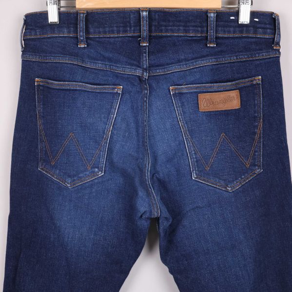 Detalj av bakfickor och patch