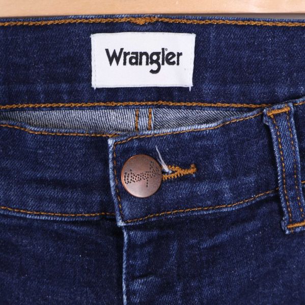 Wrangler logotyp och metallknapp