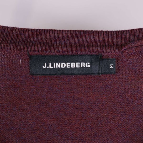 J.Lindeberg-logga och storleksetikett på insidan av krage