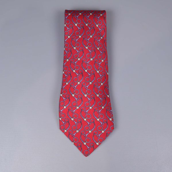 Röd Hermès slips med blått och vitt grafiskt mönster