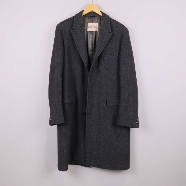 Mörkgrå lång rock fotograferad framifrån