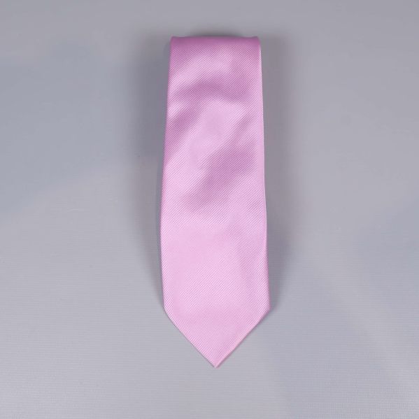 Lila slips med bred spets på grå bakgrund