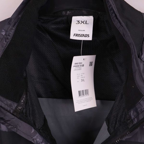 Jackans storleksetikett med FRISTADS och 3XL visas