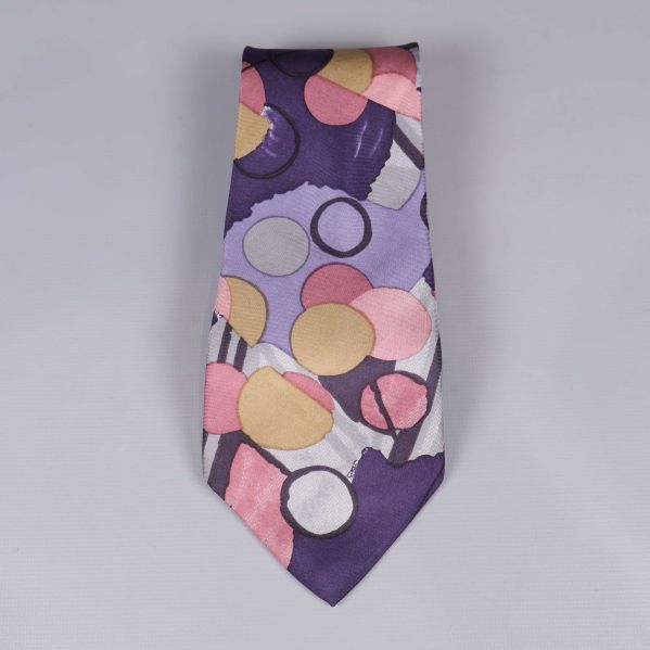 Slips med cirkelmönster i lila, rosa och gult