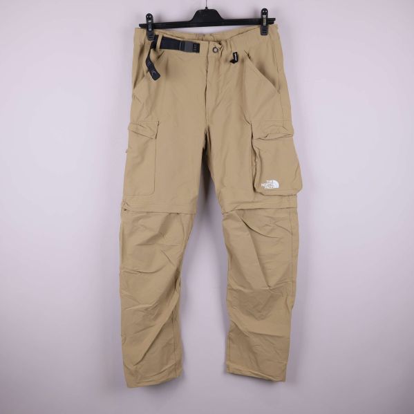 Beige friluftsbyxa med zip-off funktion och flera fickor