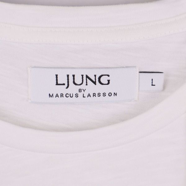 Närbild på etikett med märket Ljung by Marcus Larsson
