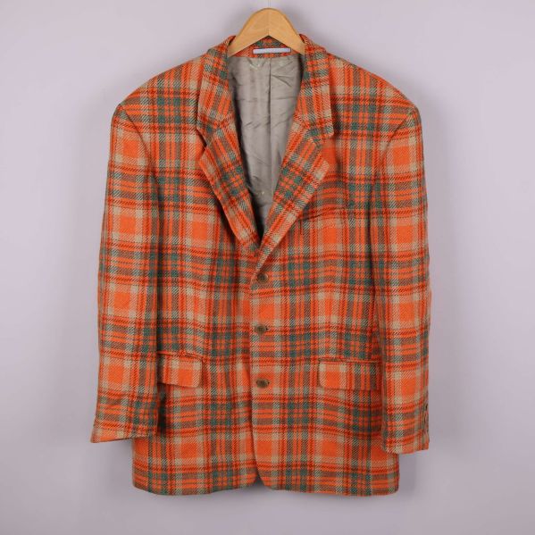 Framsida av orange och grön rutig kavaj 