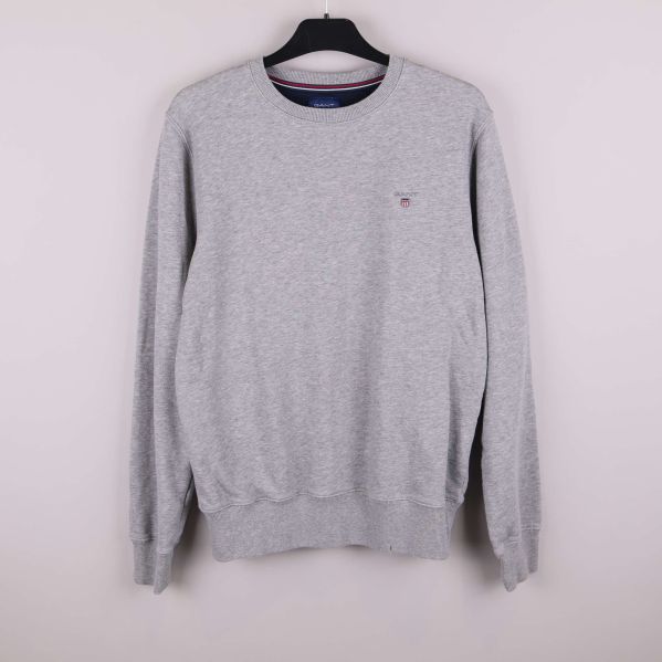 Grå sweatshirt med rund hals på galge