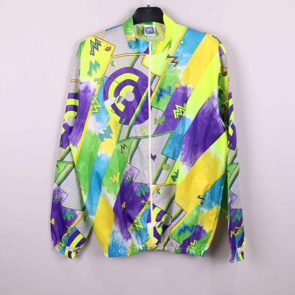 Jacka med grafiskt mönster i gult, grönt och lila framifrån