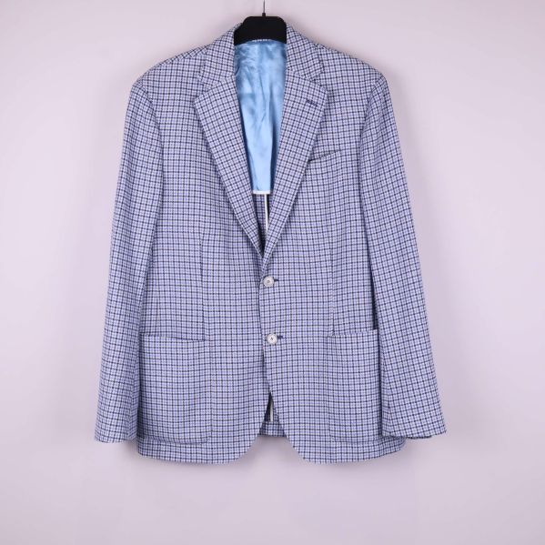 Framsidan av rutmönstrad kavaj med blå detaljer