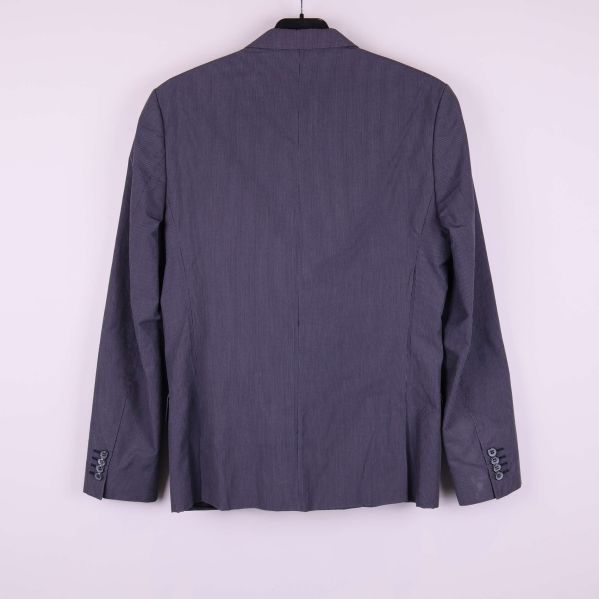 Baksidan på kostymkavaj i diskret mönster, helbild