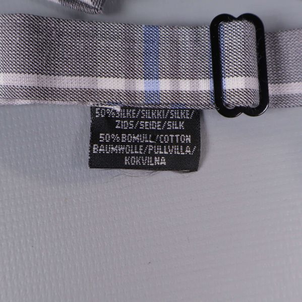 Materiallapp med texten 50% bomull 50% silke