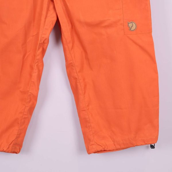 Materiallapp med information: 65% polyester, 35% bomull
