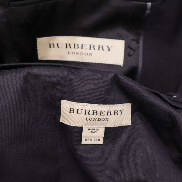 Burberry London etiketter inuti kavaj och byxa