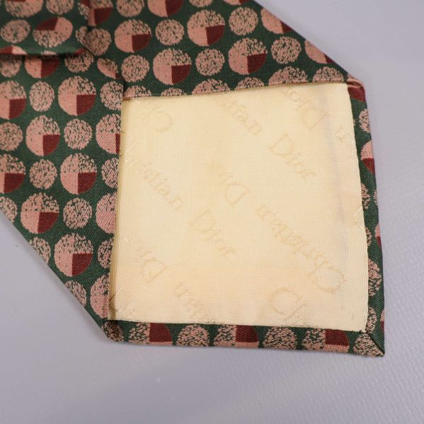 Insida av slips spetsen med Christian Dior-logotyp i tyg