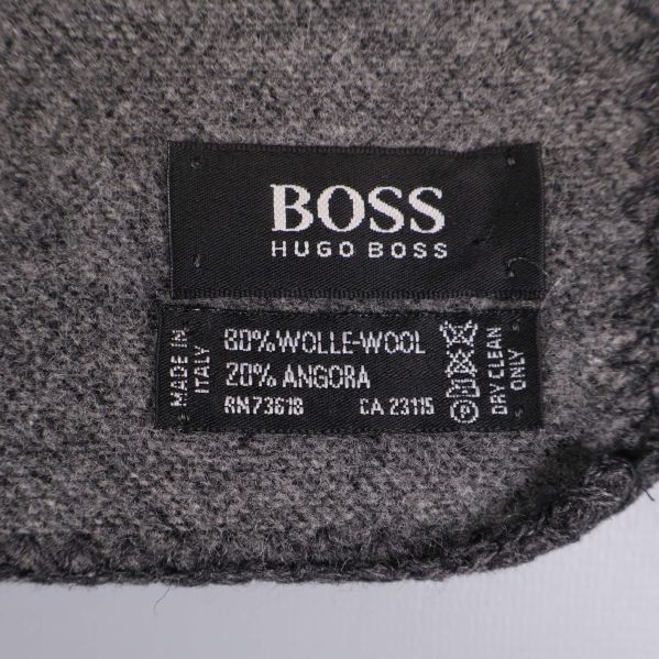 Materialetikett med BOSS Hugo Boss och materialinnehåll