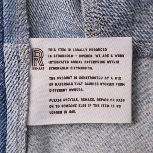 Insida med etikett om materialmix och lokal produktion