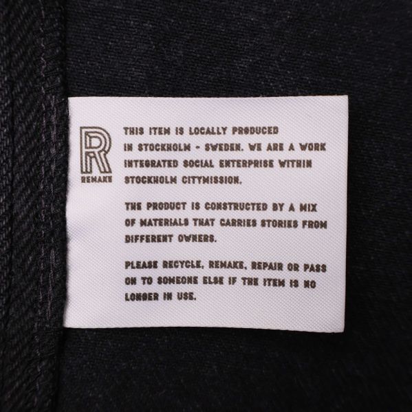 Etikett med Remake-logotyp och information om produkten