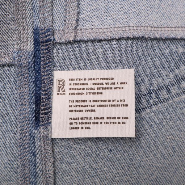 Inneretikett med information om tillverkning och materialblandning