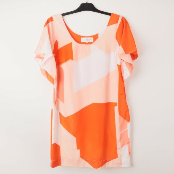 Tunika med orange och rosa grafiskt mönster, framifrån
