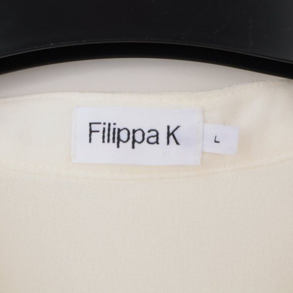 Filippa K etikett med storlek: L