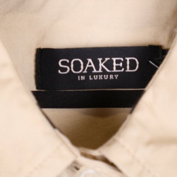 Soaked in Luxury logotyp på etiketten