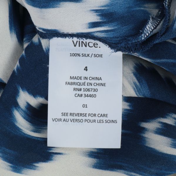 Materialetikett med siden och tillverkningsland