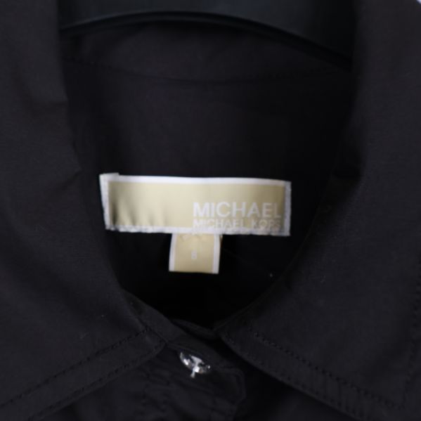 Michael Kors etikett synlig på insidan