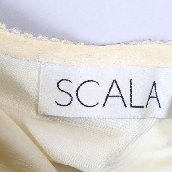 Märketikett med texten SCALA