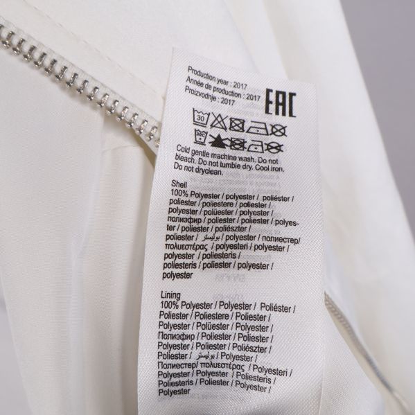 Materialinformation på tvättrådsetikett