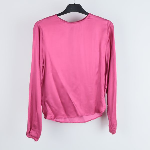 Rosa blus sidosikt med slät design