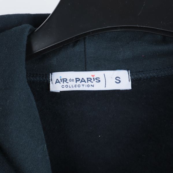 Etikett med Air de Paris Collection och storlek small