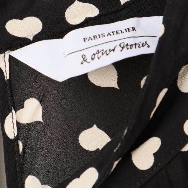 Närbild på etikett : & Other Stories
