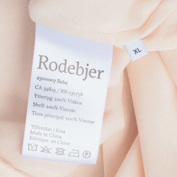 Materialetikett visar : 100% viskos